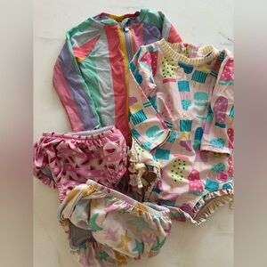 Ruffle Butts Colorful Kids Swim One Piece Set and two swim diapers